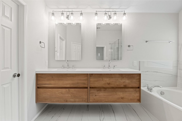 full bathroom featuring a sink, a shower with shower door, a bath, and double vanity