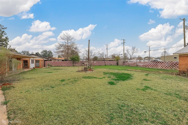 view of yard with fence