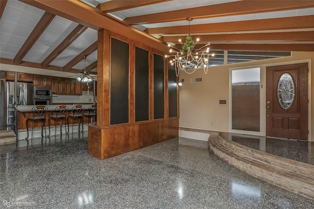 interior space featuring visible vents and ceiling fan with notable chandelier