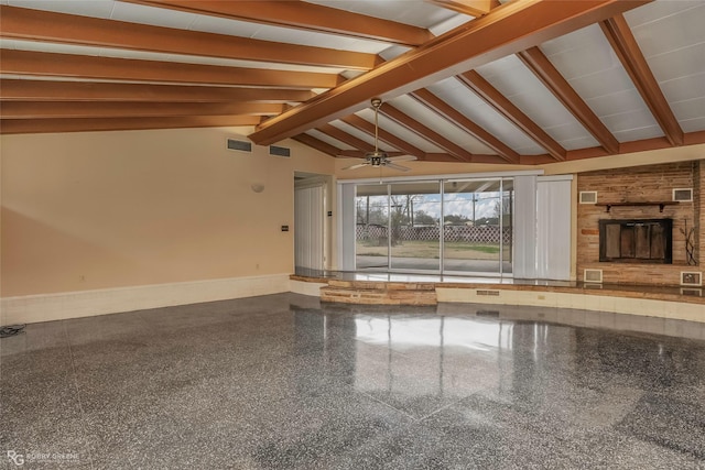 unfurnished living room with visible vents, vaulted ceiling with beams, baseboards, granite finish floor, and a ceiling fan