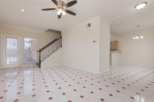 entryway with visible vents, baseboards, ornamental molding, and stairs