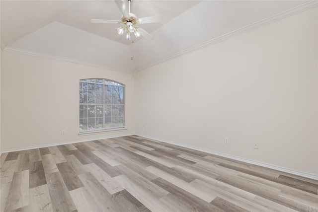 empty room featuring vaulted ceiling, baseboards, light wood-type flooring, and ceiling fan