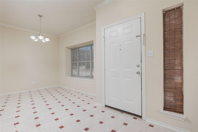 entryway with crown molding, baseboards, and a chandelier