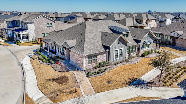 drone / aerial view featuring a residential view