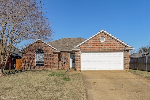 ranch-style home featuring a front yard, fence, an attached garage, concrete driveway, and brick siding