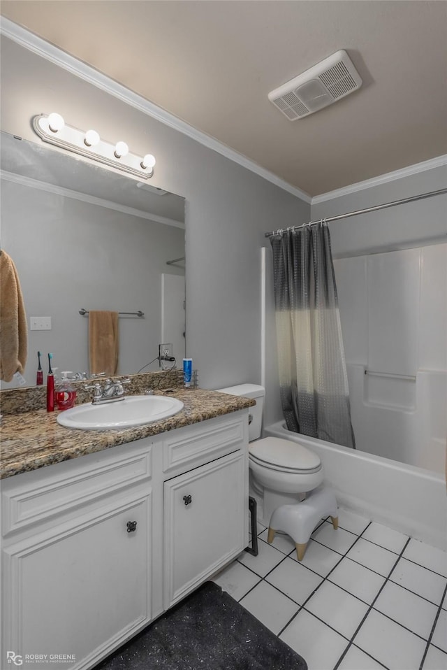 bathroom featuring vanity, crown molding, visible vents, and tile patterned floors