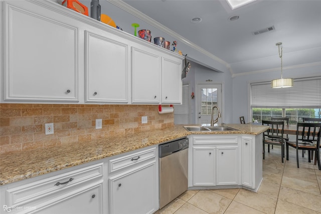 kitchen featuring visible vents, a sink, tasteful backsplash, white cabinets, and dishwasher