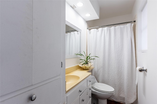 1306 N Floyd Rd, Richardson, TX 75080 - full bathroom featuring vanity, toilet, and a shower with curtain