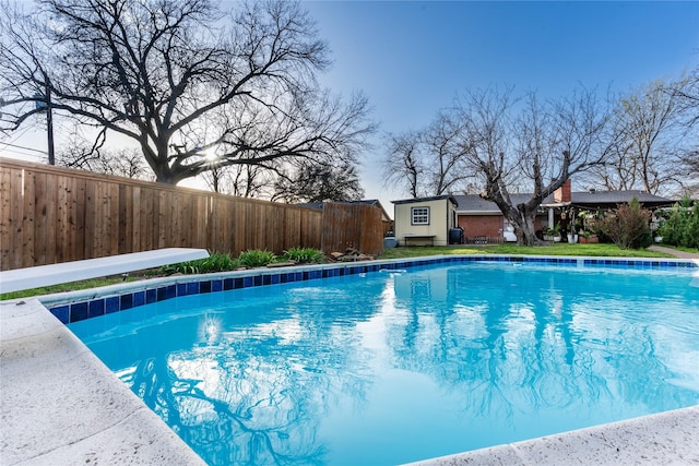 1306 N Floyd Rd, Richardson, TX 75080 - view of swimming pool with a fenced in pool and a fenced backyard