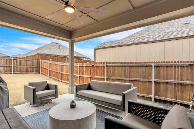 view of patio featuring an outdoor hangout area, a fenced backyard, and ceiling fan