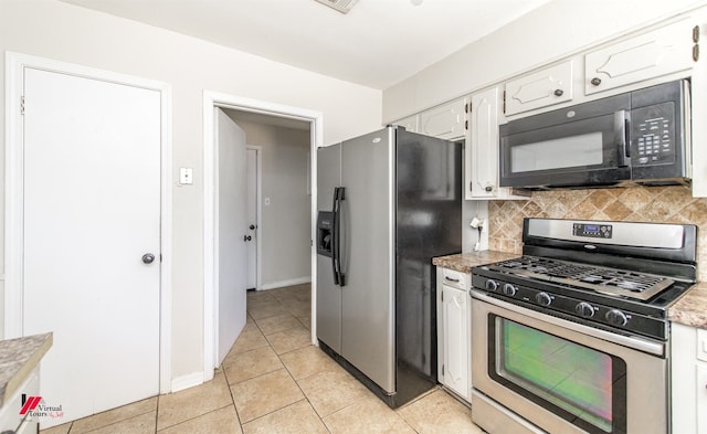 kitchen featuring backsplash, white cabinetry, appliances with stainless steel finishes, light countertops, and light tile patterned floors