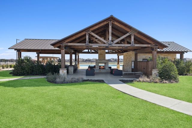 surrounding community with a gazebo and a yard