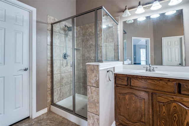 full bathroom with tile patterned floors, vanity, and a shower stall