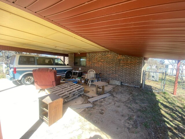 view of patio / terrace with a gate and fence