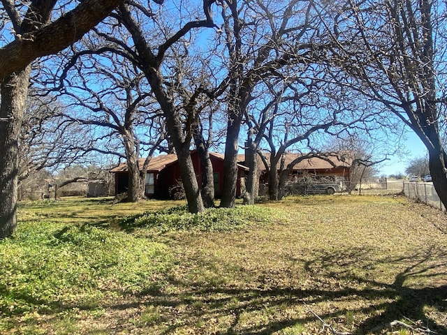 view of yard with fence