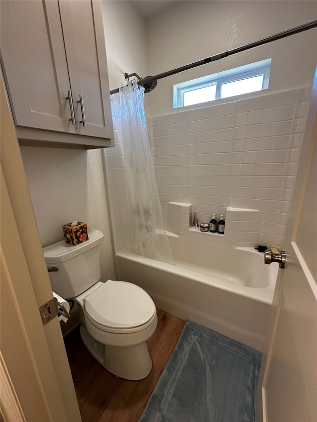 full bath with shower / bath combination with curtain, toilet, and wood finished floors