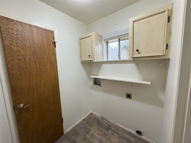 washroom with baseboards, dark wood finished floors, washer hookup, cabinet space, and electric dryer hookup