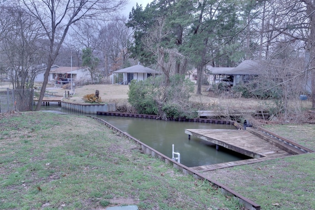 view of dock with a water view