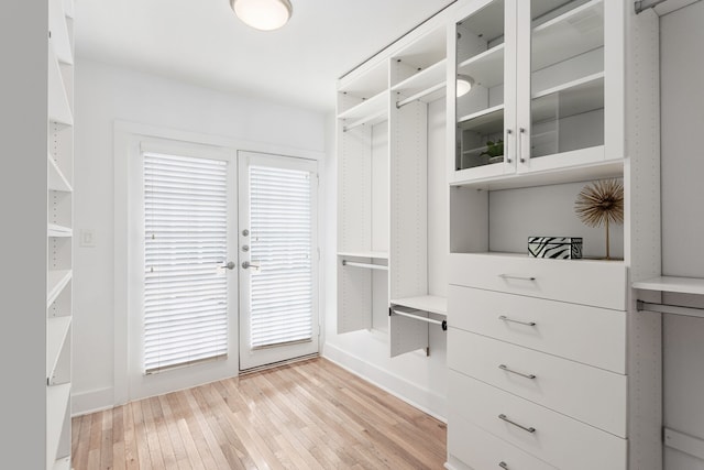 spacious closet with light wood-style flooring