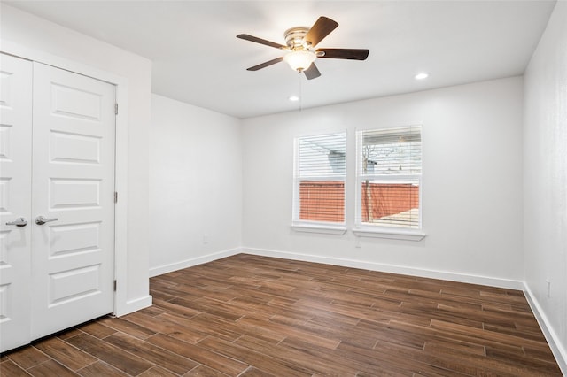 unfurnished room featuring dark wood-type flooring, recessed lighting, baseboards, and ceiling fan