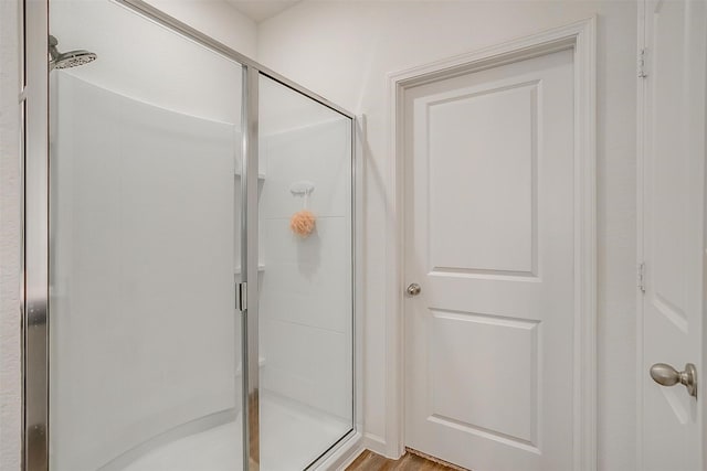 bathroom with a stall shower