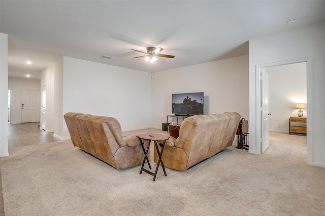 carpeted living room with recessed lighting, visible vents, baseboards, and ceiling fan