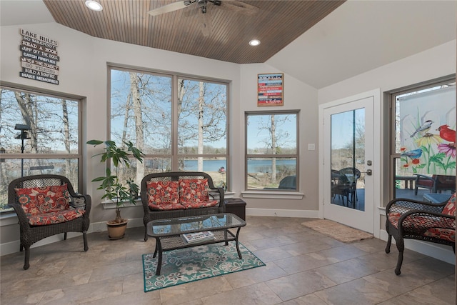 sunroom / solarium with wooden ceiling, a water view, a ceiling fan, and vaulted ceiling