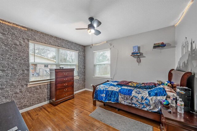 421 Murrey, Canton, TX 75103 - bedroom featuring hardwood / wood-style flooring, a ceiling fan, and baseboards