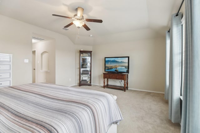 bedroom with visible vents, light colored carpet, baseboards, and a ceiling fan