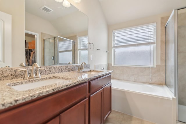 full bathroom with a sink, visible vents, a stall shower, and tile patterned flooring