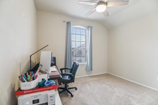 carpeted office with vaulted ceiling, baseboards, and ceiling fan