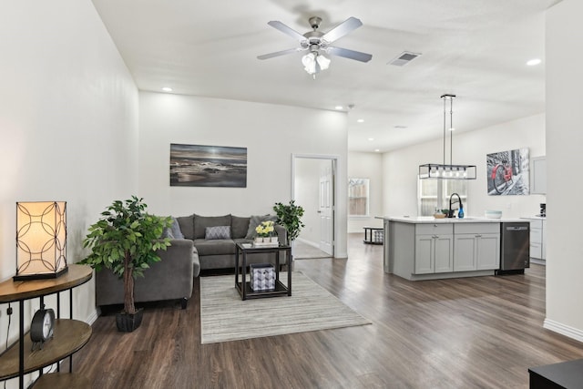 living area with dark wood finished floors, recessed lighting, a ceiling fan, and visible vents