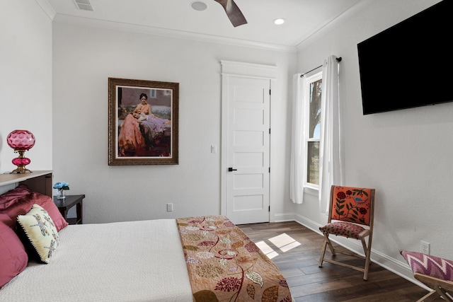 bedroom featuring a ceiling fan, wood finished floors, baseboards, recessed lighting, and crown molding