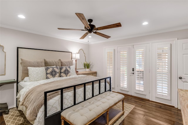 bedroom with ornamental molding, wood finished floors, and access to outside