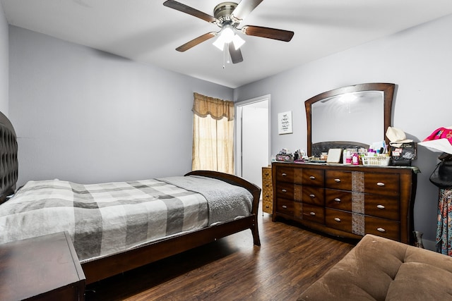 bedroom with a ceiling fan and wood finished floors