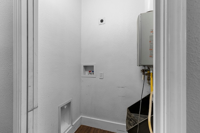 laundry room with dark wood-type flooring, washer hookup, baseboards, hookup for an electric dryer, and laundry area