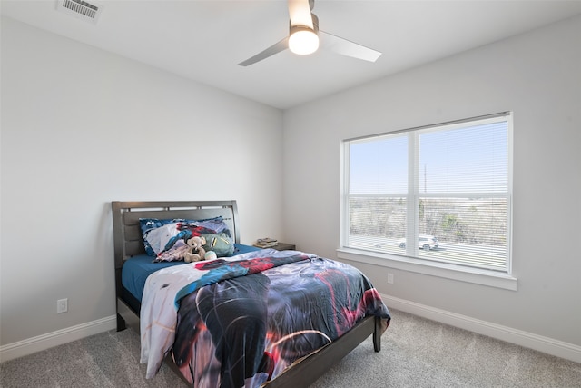 bedroom featuring baseboards, visible vents, and carpet floors