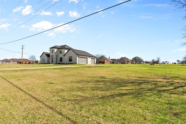 view of yard with an attached garage