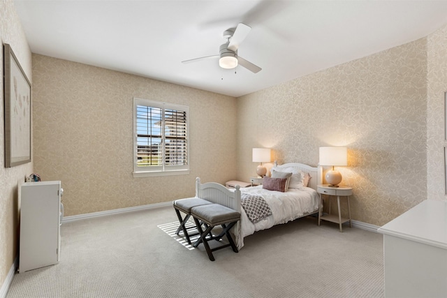 bedroom with baseboards, carpet, and wallpapered walls