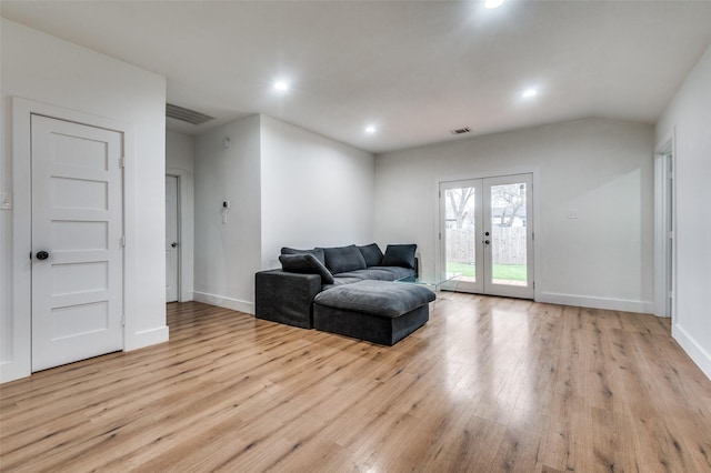 1818 Engle Ave, Dallas, TX 75224 - sitting room featuring french doors, light wood-type flooring, recessed lighting, and baseboards