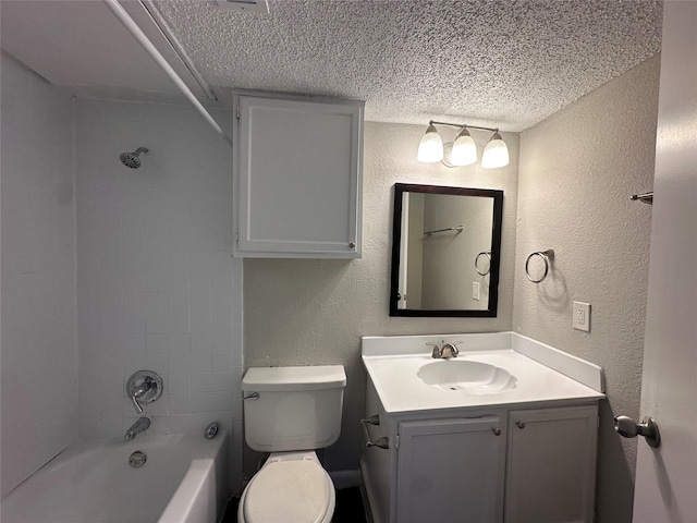 full bath featuring vanity, a textured ceiling, shower / tub combination, toilet, and a textured wall