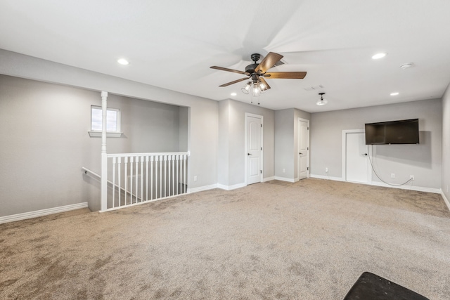 unfurnished living room featuring recessed lighting, baseboards, and carpet floors