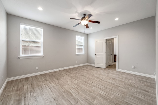 unfurnished room featuring recessed lighting, baseboards, light wood finished floors, and ceiling fan