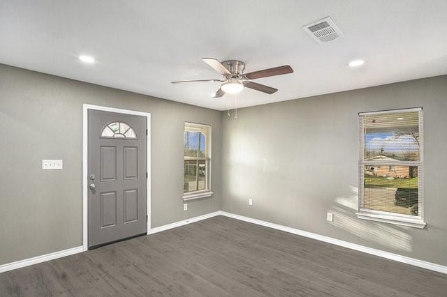 entryway featuring a ceiling fan, dark wood-style floors, baseboards, visible vents, and recessed lighting