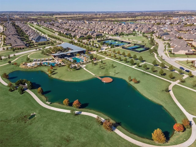 bird's eye view featuring a residential view and a water view