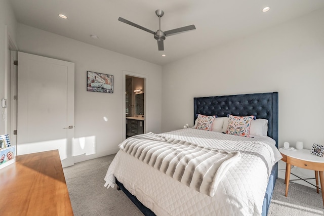 bedroom featuring recessed lighting, carpet, baseboards, and ensuite bathroom