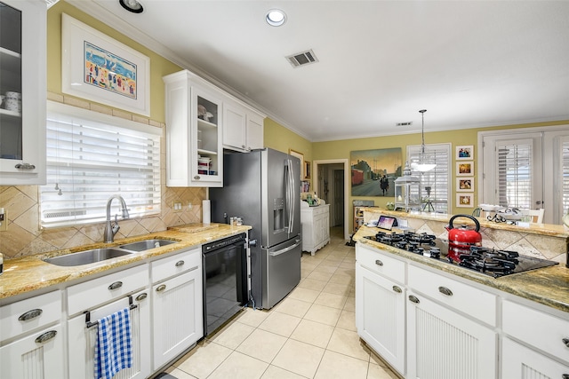 kitchen featuring visible vents, glass insert cabinets, crown molding, black appliances, and a sink