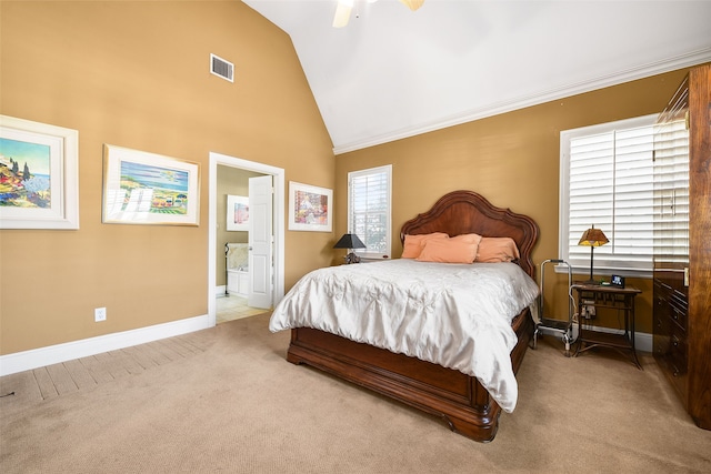 carpeted bedroom with ensuite bath, crown molding, baseboards, and visible vents