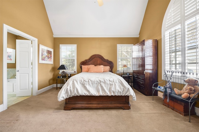 bedroom with connected bathroom, baseboards, carpet, and ornamental molding