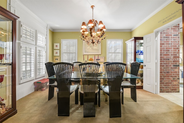 carpeted dining space with a chandelier, a wealth of natural light, and ornamental molding